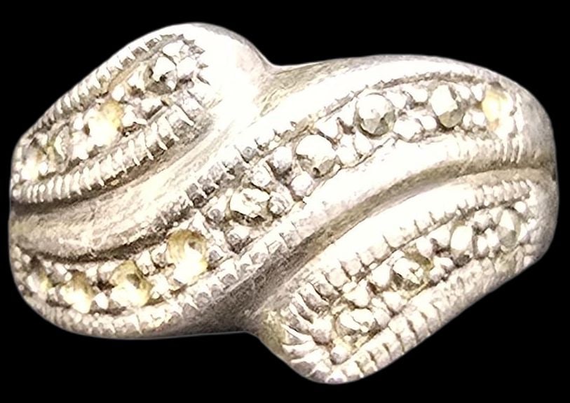 Vintage Mid-Century Sterling Silver & Marcasite Ring: Very good vintage condition with minor patina according to age. The ring is a size 7 and weighs ca. 3 grams. Marked for Sterling Silver.