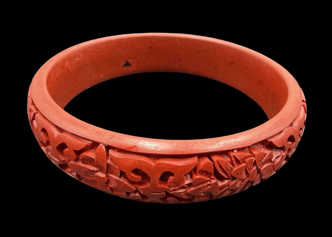 Beautiful Ornate Vintage Carved Red Cinnabar Bracelet: Very good vintage condition with minor patina according to age. Measures approx. 3" long and 1/2" wide and weighs ca. 34.5 grams.