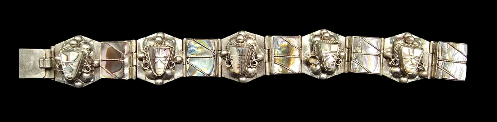 Gorgeous Vintage TAXCO Mexico Sterling Silver & Abalone Shell Mask Panel Bracelet: Very good vintage condition with minor patina according to age. Weighs ca. 45 grams. Marked for Sterling Silver.