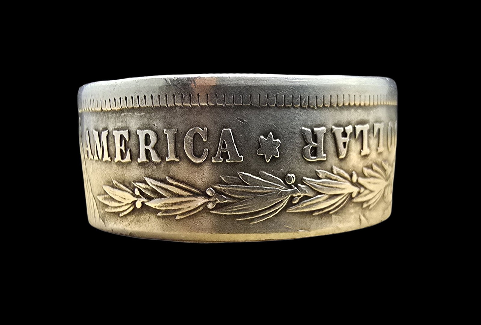 Very Unusual Vintage "Folded' 1878 Silver Morgan Dollar Coin Ring: Very good antique condition with minor patina according to age. The ring is a size 12 and weighs ca. 15 grams. Tested for silver.