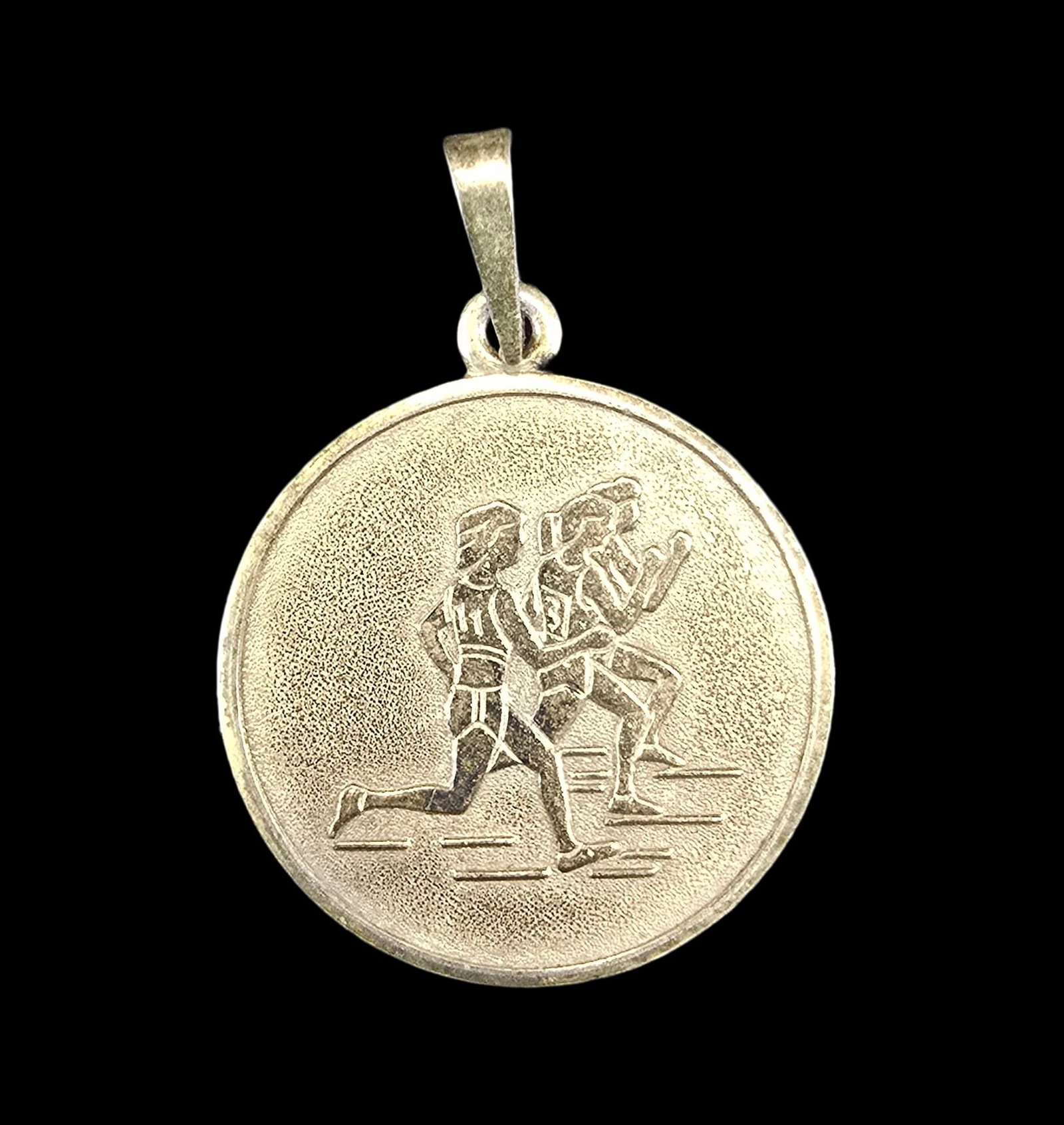Vintage Sterling Silver Track / Sprint / Sport Medallion Pendant Charm: Very good vintage condition with minor patina according to age. Measures approx. weighs ca. 3 grams. Marked for Sterling Silver..