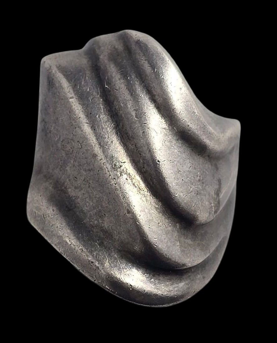 Vintage Mid-Century Modern Sterling Silver Wavy Dome Ring: Very good vintage condition with some wear and patina according to age. The ring is a size 7 and weighs ca. 12.5 grams. Marked for Sterling Silver..