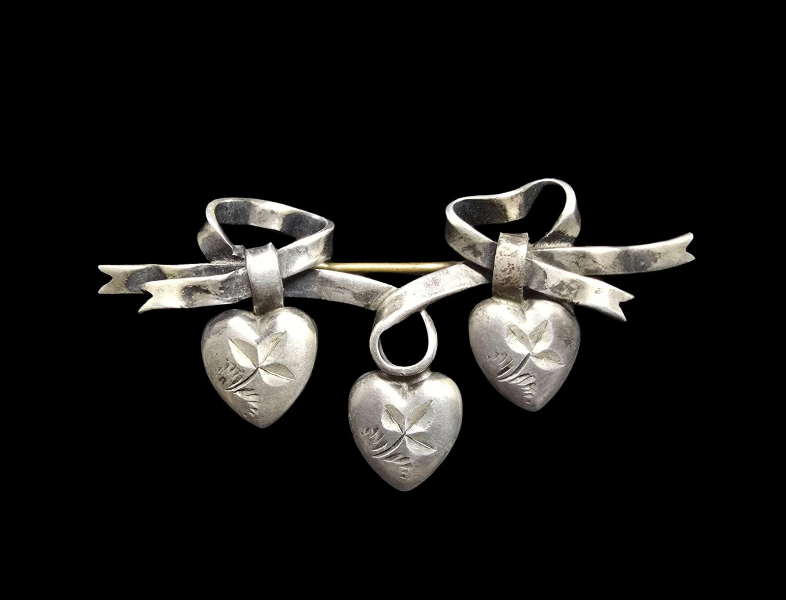 Beautiful Ornate Antique Victorian Sterling Silver & Three Hearts Pin Brooch: Very good antique condition with minor patina according to age. Measures approx. 2" wide and weighs ca. 7 grams.