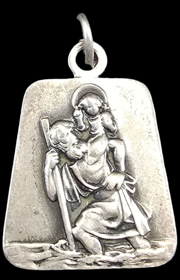 Vintage Sterling Silver Christian Religious Saint Christopher Pendant Charm: Very good vintage condition with minor patina according to age. Measures approx. 1" long x 1/2" wide and weighs ca. 3.5 grams. Marked and signed.