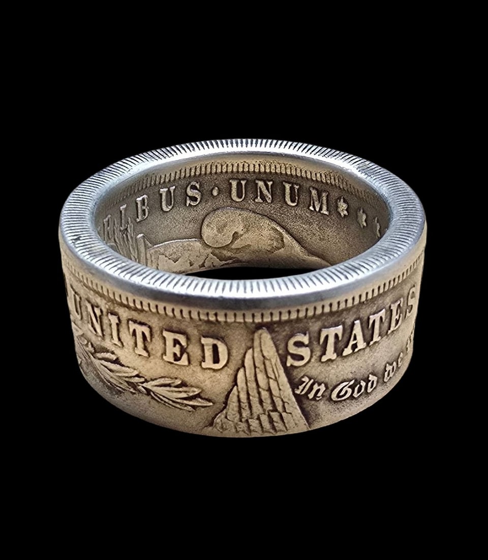 Very Unusual Vintage US Morgan Silver Dollar "Folded" Coin Ring: Very good antique condition with minor patina according to age. The ring is a size 12 and weighs ca. 15 grams.