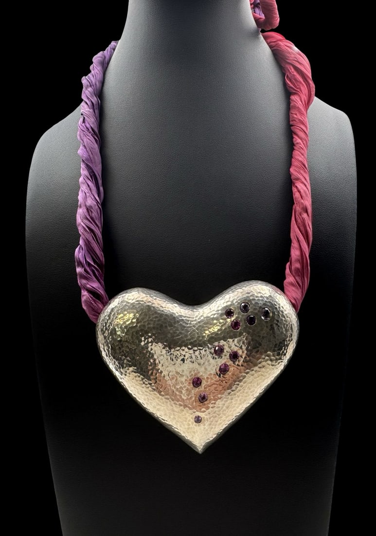 Large Vintage European Hand Hammered Sterling Silver & Pink Tourmaline Designer Heart Pendant & Silk: Very good vintage condition with minor patina according to age. Necklace measures approx. 49" long and total weight is ca. 103 grams. Pendant measures approx. 3 1/2" long x 3" wide. Marked for Sterlin