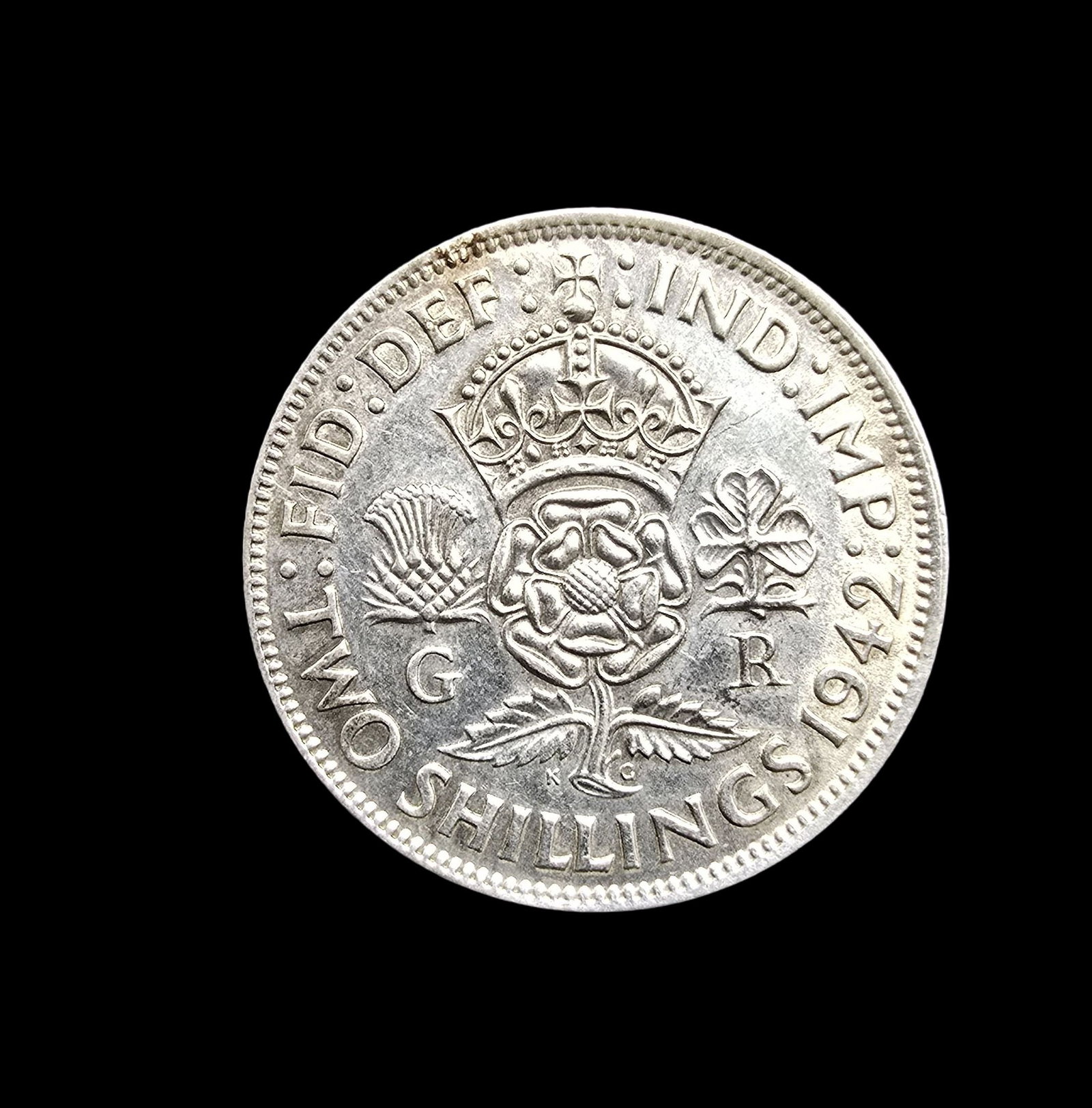Vintage 1942 British King George IV Two Shillings Silver Coin Brooch Pin: Very good vintage condition with minor patina according to age. Measures approx. 1" wide and weighs ca. 11.5 grams.