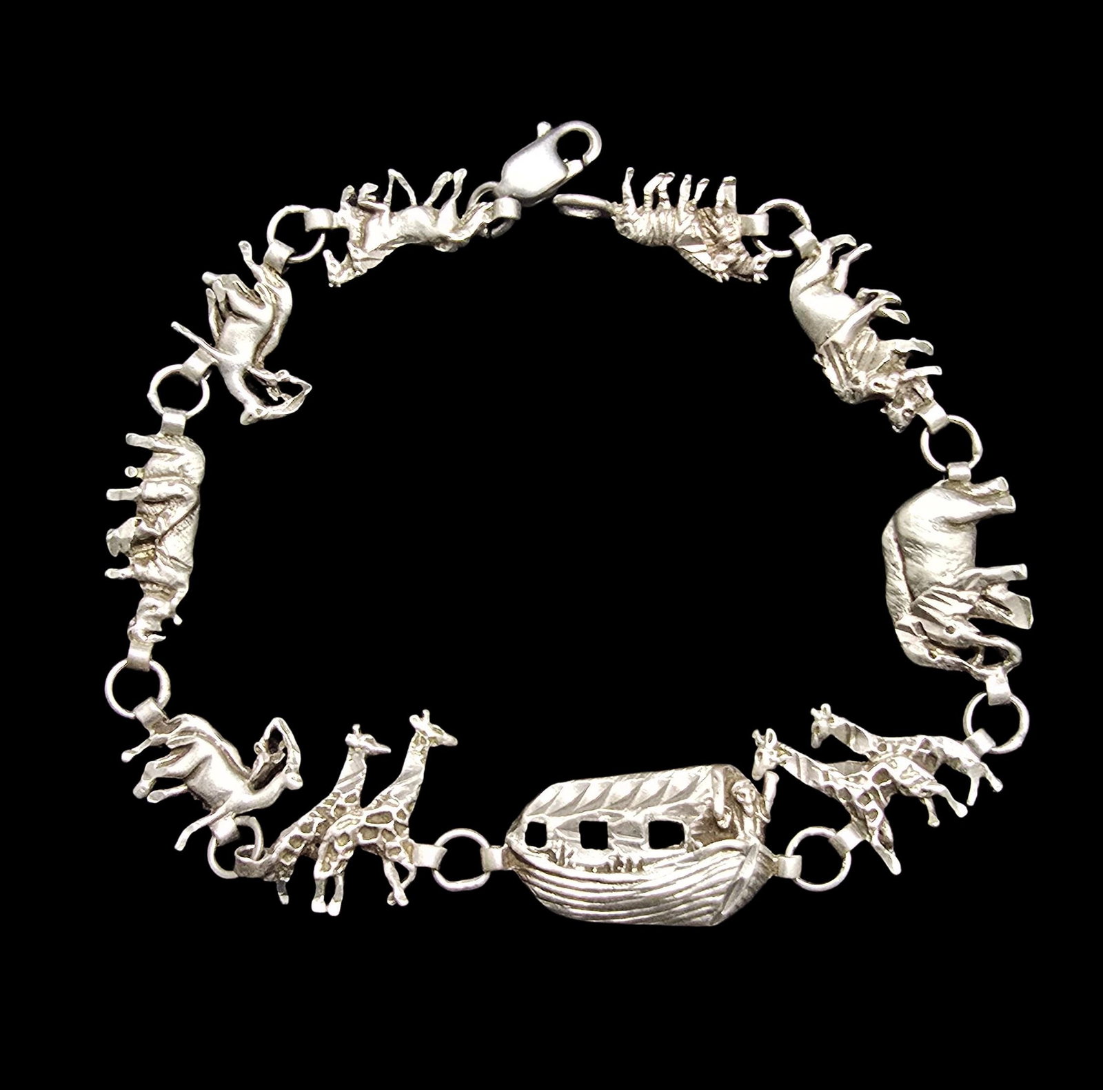 Beautiful Vintage Sterling Silver Noah's Ark Biblical/Bible Chain Link Bracelet: Very good vintage condition with minor patina according to age. Measures approx. 8 1/2" long and weighs ca. 8.5 grams. Marked for Sterling Silver.