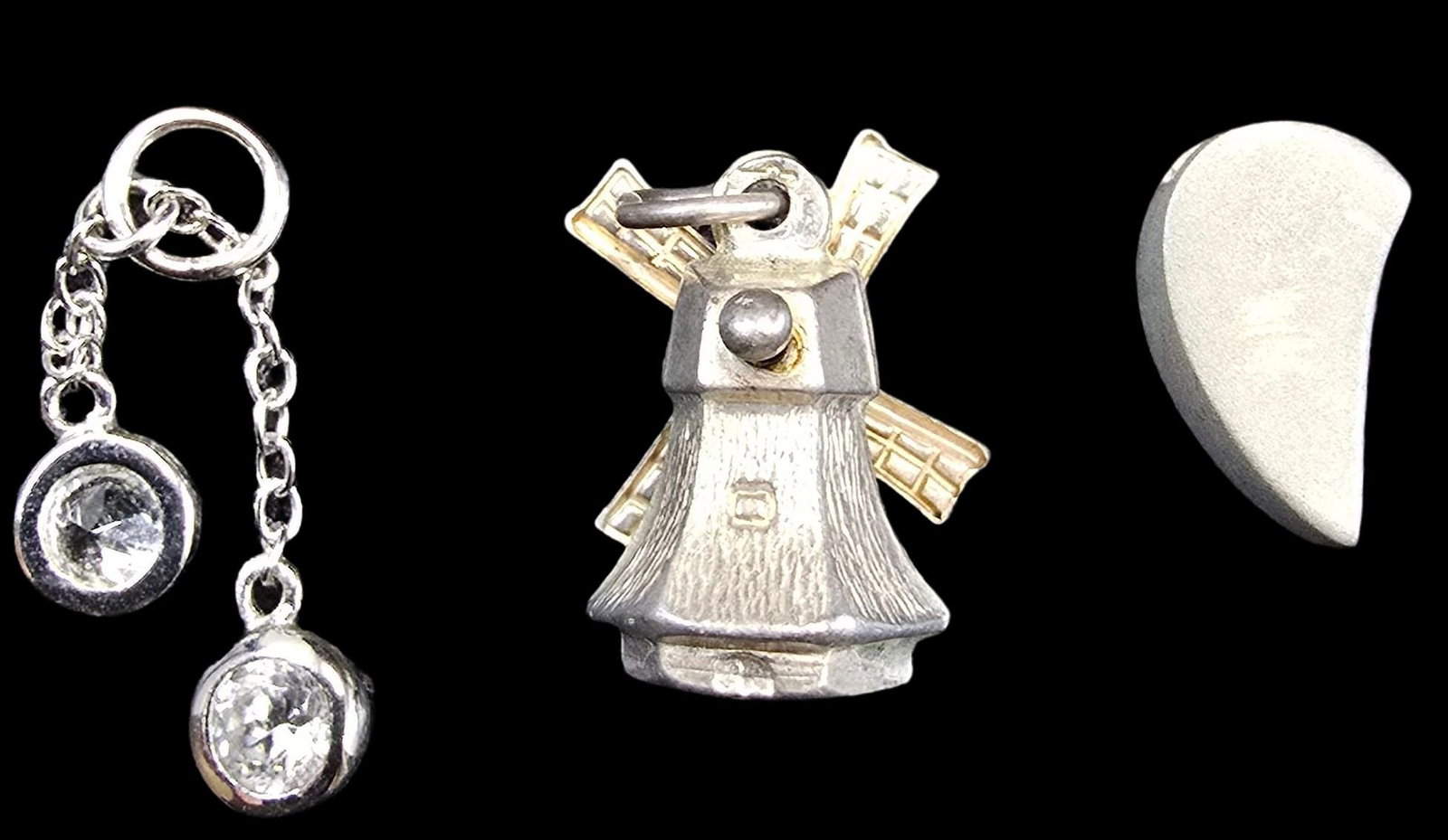Lot of 3 Silver Pendant Charms: Very good vintage condition with minor patina according to age. Each measures approx. 1/2" high and weighs ca. 1 gram. Partially marked; Tested for silver.