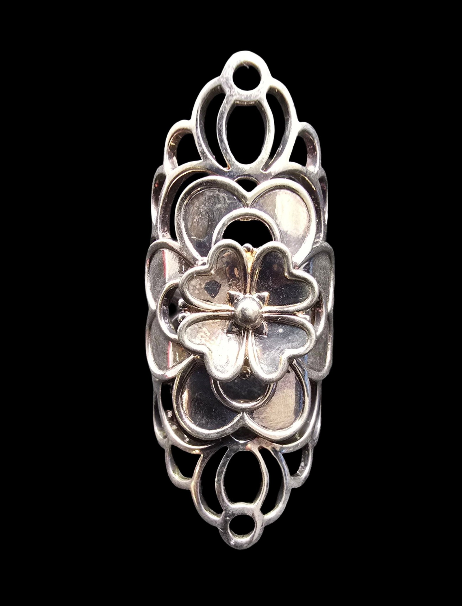 Beautiful & Very Unusual Ornate Vintage Sterling Silver Cocktail Ring: Very good vintage condition with minor patina according to age. Measures approx. 1" wide and weighs ca. 10 grams. The ring is a size 5. Marked for Sterling Silver.