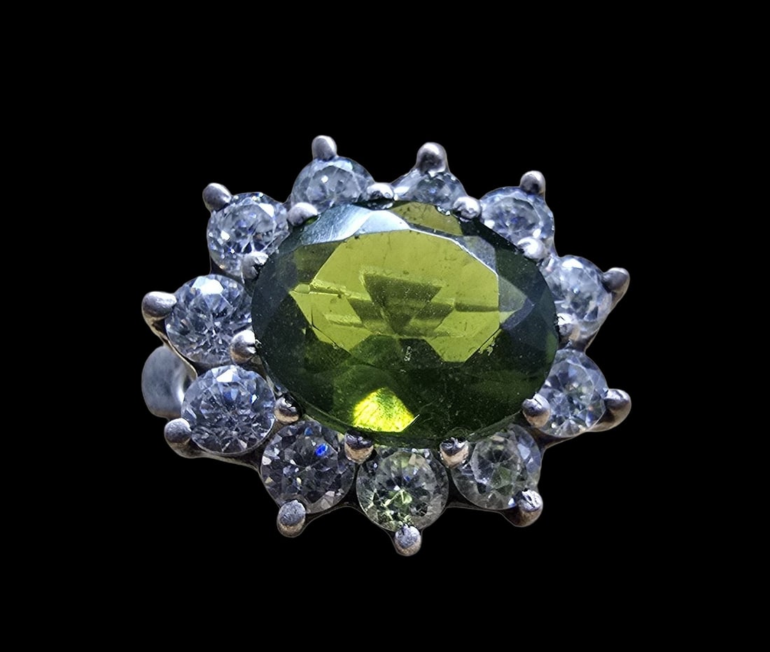 Beautiful Vintage Sterling Silver, Peridot & Clear Rhinestone Clip-On Earrings: Very good vintage condition with minor patina according to age. Each measures 1" long and they jointly weigh ca. 2.5 grams. Marked for Sterling Silver.