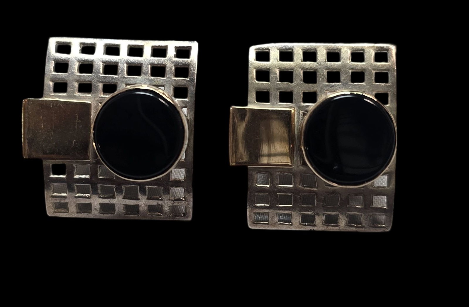 Vintage Mid-Century Sterling Silver, 14K Gold & Onyx Earrings: Very good vintage condition with some patina and wear according to age. Each measures approx. 1" wide x 1/2" high and weighs ca. 5 grams. Marked for Sterling Silver. and 14K Gold and carrying an unide