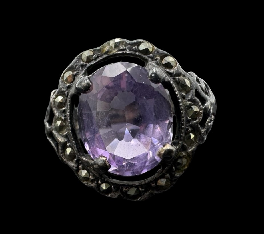 Unusual Vintage Sterling Silver, Marcasite & Amethyst Ring: Very good vintage condition with minor patina according to age. Measures approx. 3/4" long x 3/4" wide and weighs ca. 6.7 grams. The ring is a size 7. Marked for Sterling Silver..