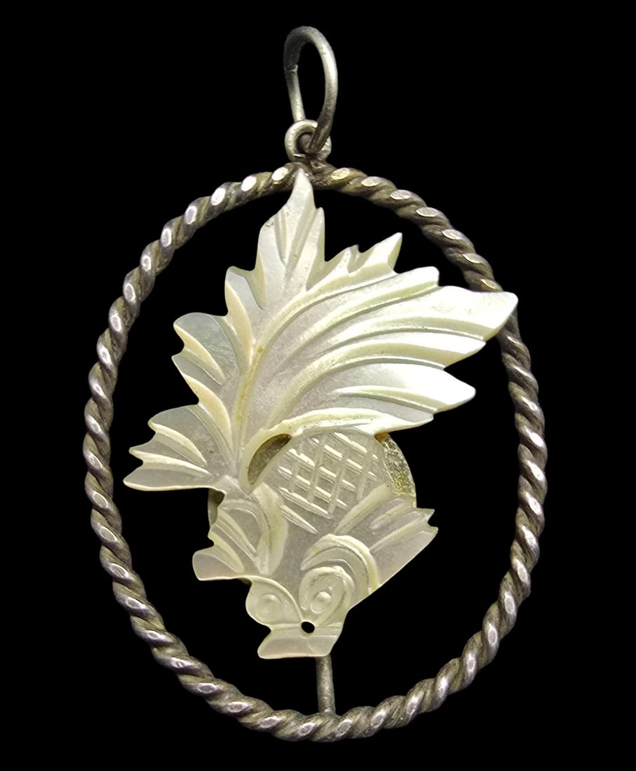 Ornate Vintage European 835 Silver & Carved Mother of Pearl Pendant Charm: Very good vintage condition with minor patina according to age. Measures approx. 1 1/2" long and 1" wide and weighs ca. 3 grams. Marked for 835 Silver.