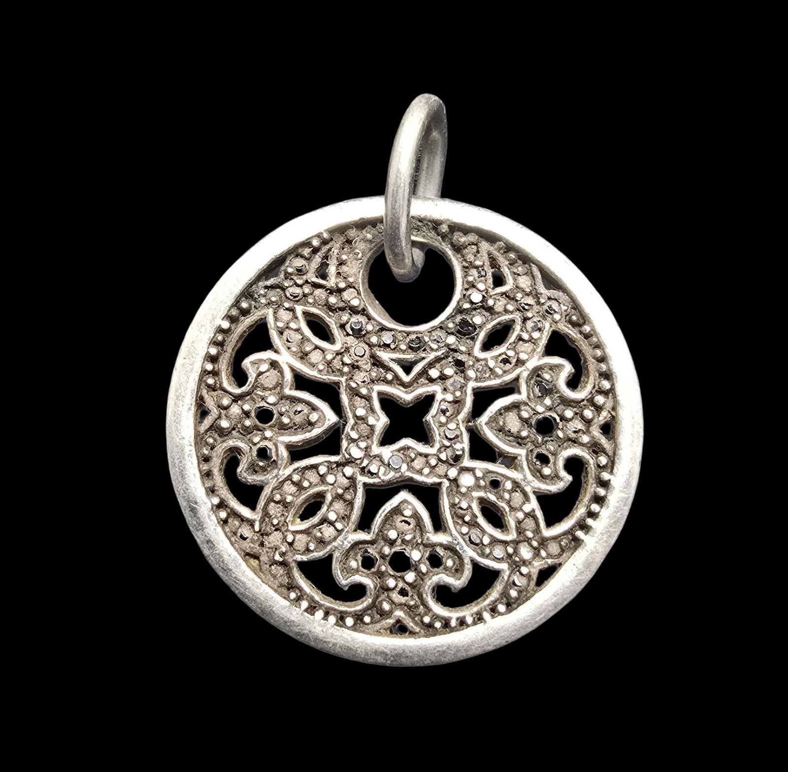 Ornate Vintage European Sterling Silver & Black Gemstone Pendant: Very good vintage condition with minor patina according to age. Measures approx. 1" wide and weighs ca. 5 grams. Marked for Sterling Silver.
