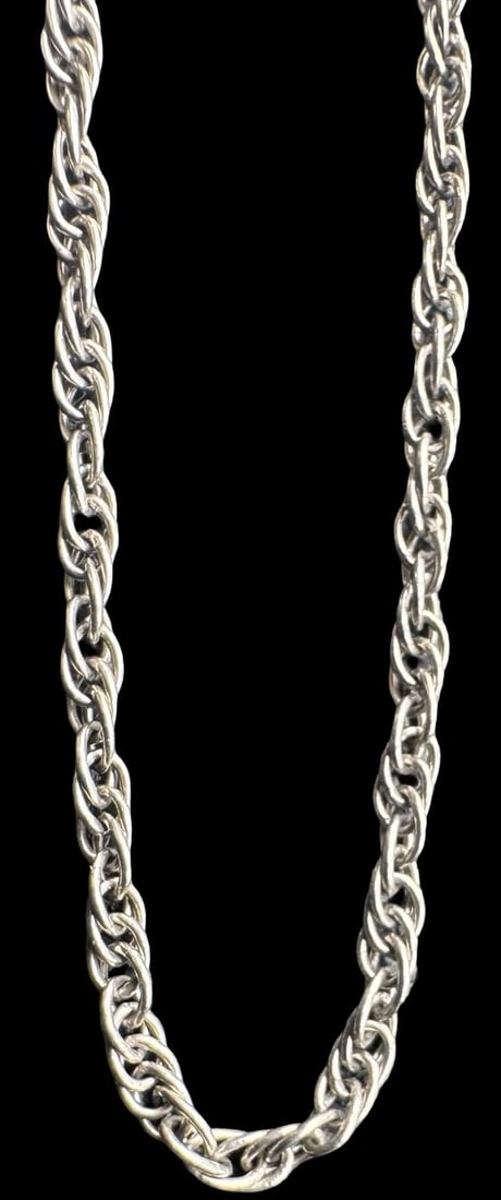 Stylish Vintage Sterling Silver Chain Necklace: Very good vintage condition with minor patina according to age. Measures approx. 18" long x 1/16" wide and weighs ca. 3.7 grams. Marked for Sterling Silver..