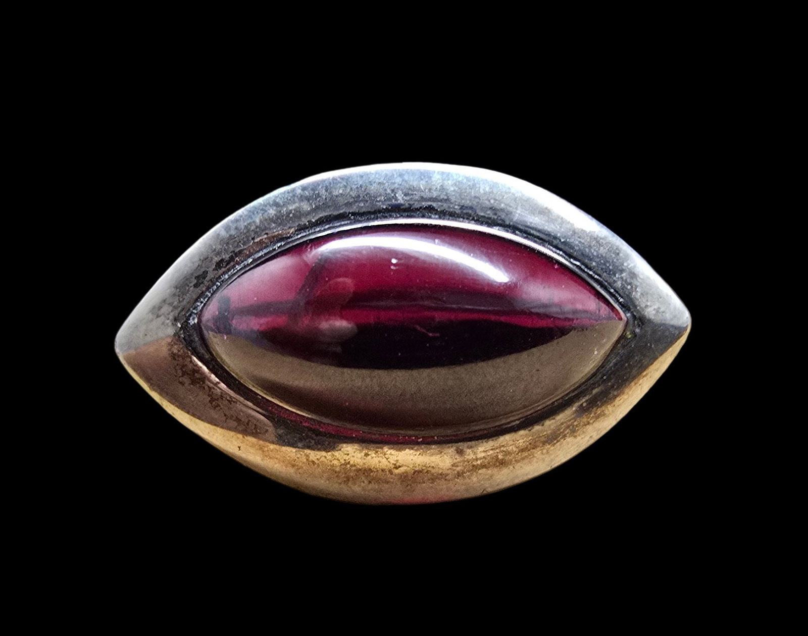 Very Unusual Vintage Mid-Century Modern Sterling Silver & Garnet Ring: Very good vintage condition with minor patina according to age. Measures approx. 1" wide and weighs ca. 13 grams. The ring is a size 9. Marked for Sterling Silver.