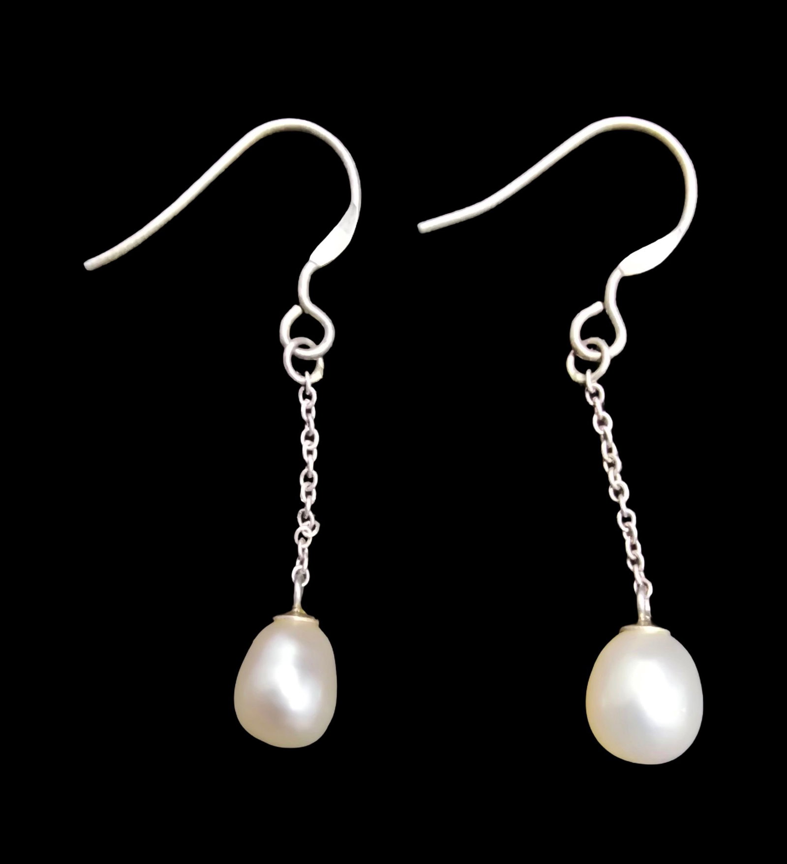 Beautiful Vintage Sterling Silver & Natural Pearl Drop Earrings: Very good vintage condition with minor patina according to age. Each measures approx. 1 1/2" long and they jointly weigh ca. 1.5 grams. Marked for Sterling Silver.