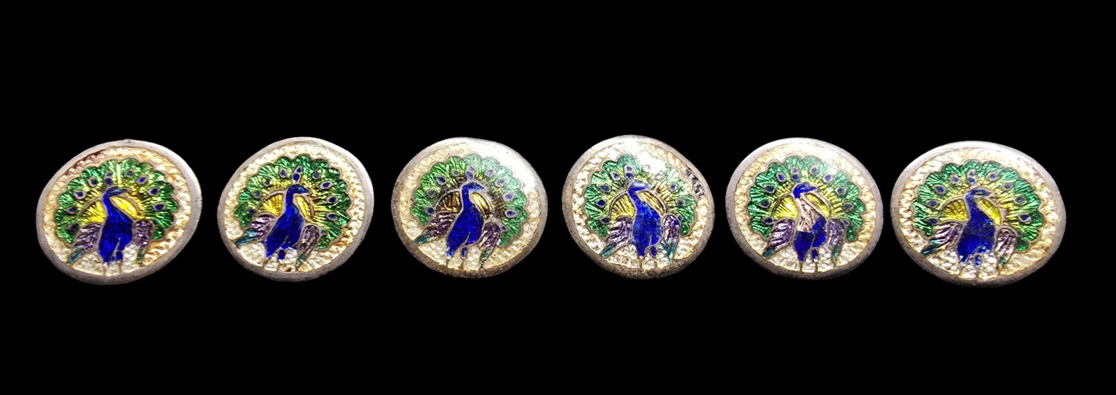 Gorgeous Vintage Set of 6 Handpainted Sterling Silver & Enamel Peacock Buttons: Very good vintage condition with minor patina according to age. Each measures approx. 1" wide and they jointly weigh ca. 14 grams. Tested for Silver.