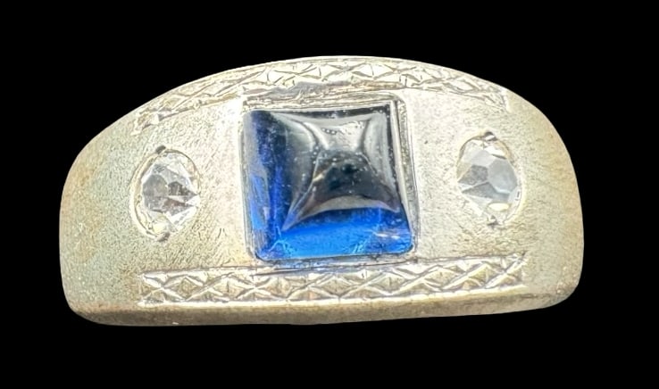 Vintage UNCAS Manufacturing Company Sterling Silver & Blue Gemstone Designer Ring: Very good vintage condition with minor patina according to age. Measures approx. 3/8" wide and weighs ca. 9.5 grams. The ring is a size 11. Marked for Sterling Silver. & UNCAS.