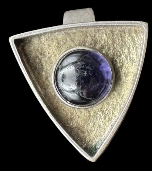 Unusual Vintage Mid-Century Modern Sterling Silver, Gold & Amethyst Studio Ring: Very good vintage condition with minor patina according to age. Measures approx. 1 5/8" long x 1/2" wide and weighs ca. 6.1 grams. The ring is a size 5 1/2". Marked for Sterling Silver..