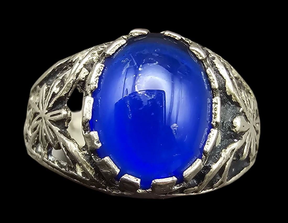 Unusual Vintage Sterling Silver & Blue Glass Stone Ring: Very good vintage condition with some patina and wear according to age. The ring is a size 7 and weighs ca. 2.24 grams. Tested for Sterling Silver.