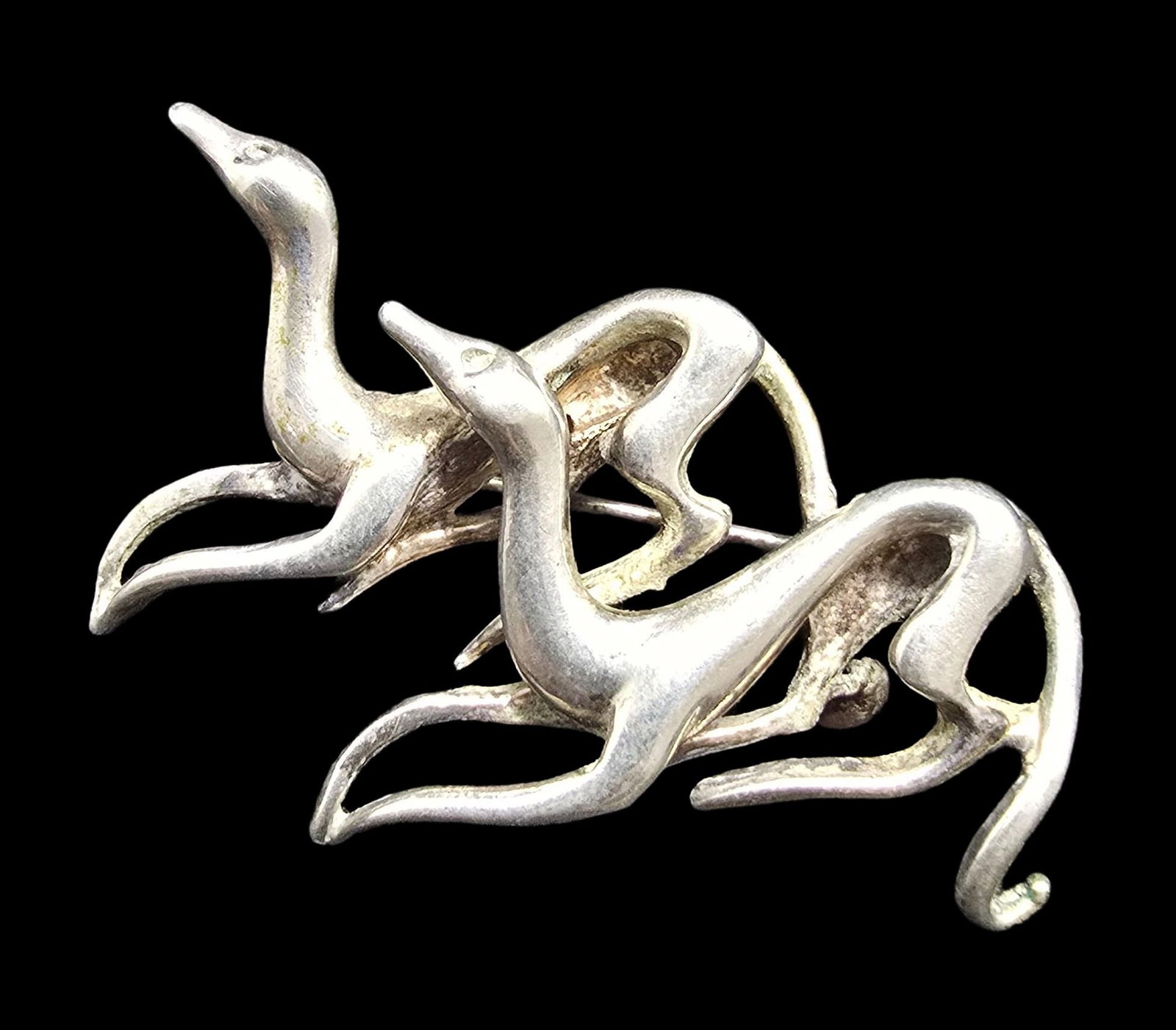 Amazing Vintage Sterling Silver Two Running Greyhounds Designer Pin Brooch: Very good vintage condition with minor patina according to age. Measures approx. 1 1/2" long and 2" wide and weighs ca. 20 grams. Marked for Sterling Silver and carrying an unidentified designer mark.
