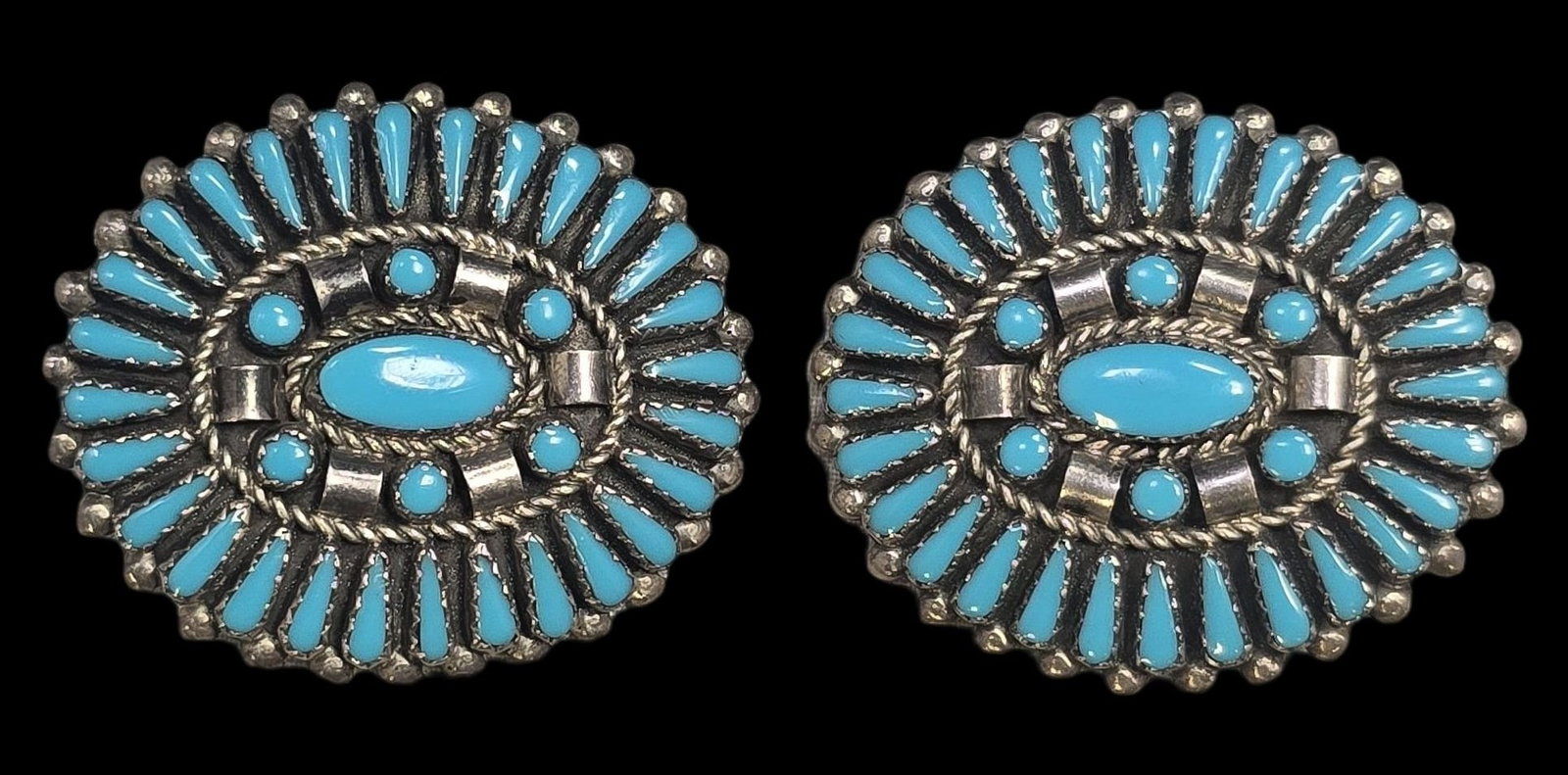 Vintage Native American Zuni Sterling Silver & Turquoise Cluster Earrings: Very good vintage condition with minor patina and wear according to age. Each measures approx. 1 1/2" wide and weighs ca. 10.5 grams. Marked for Sterling Silver..