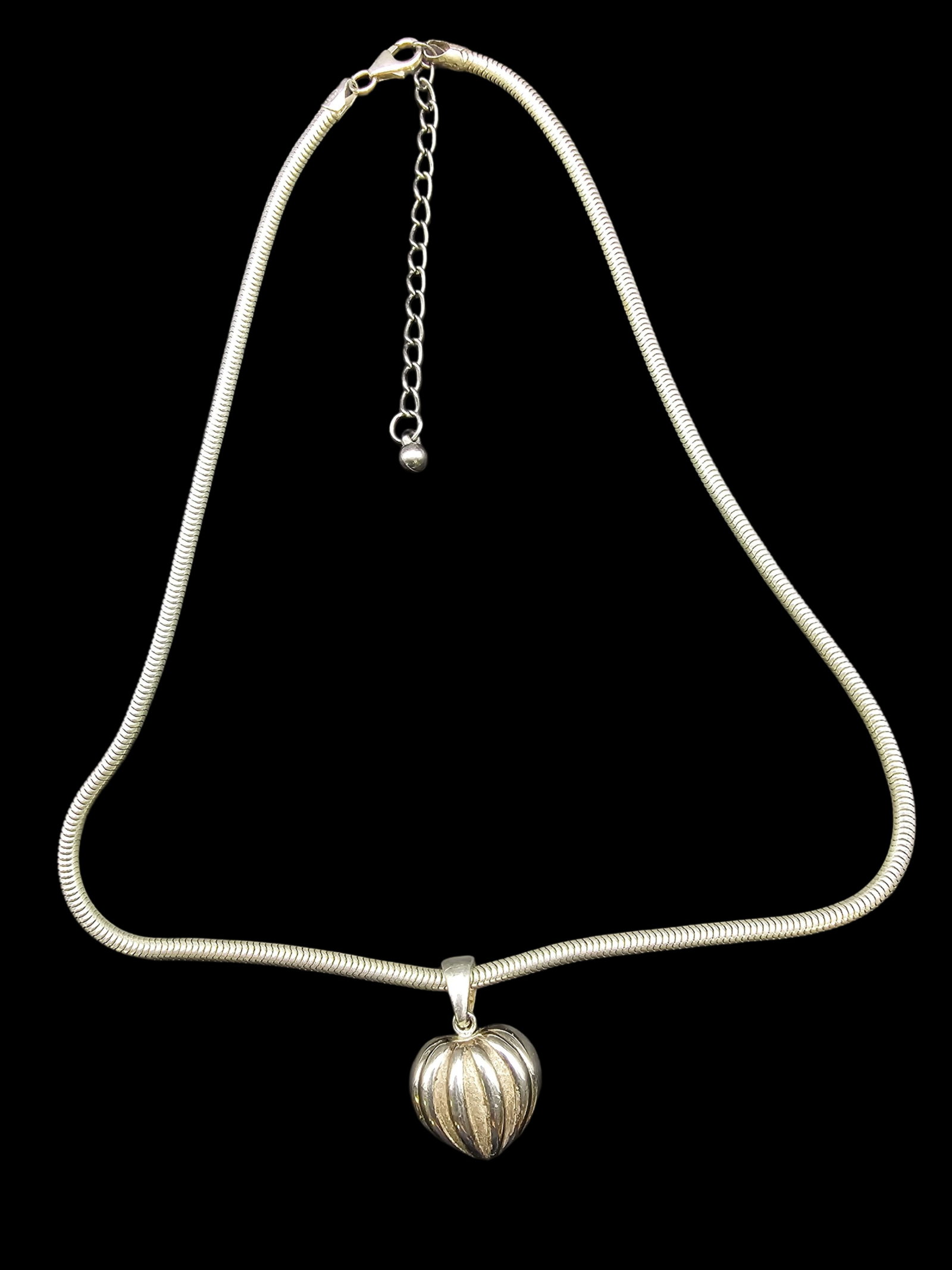 Unusual Vintage Sterling Silver Scalloped Heart Pendant Necklace: Very good vintage condition with some patina and wear according to age. Measures approx. weighs ca. 23.14 grams. Marked for Sterling Silver..