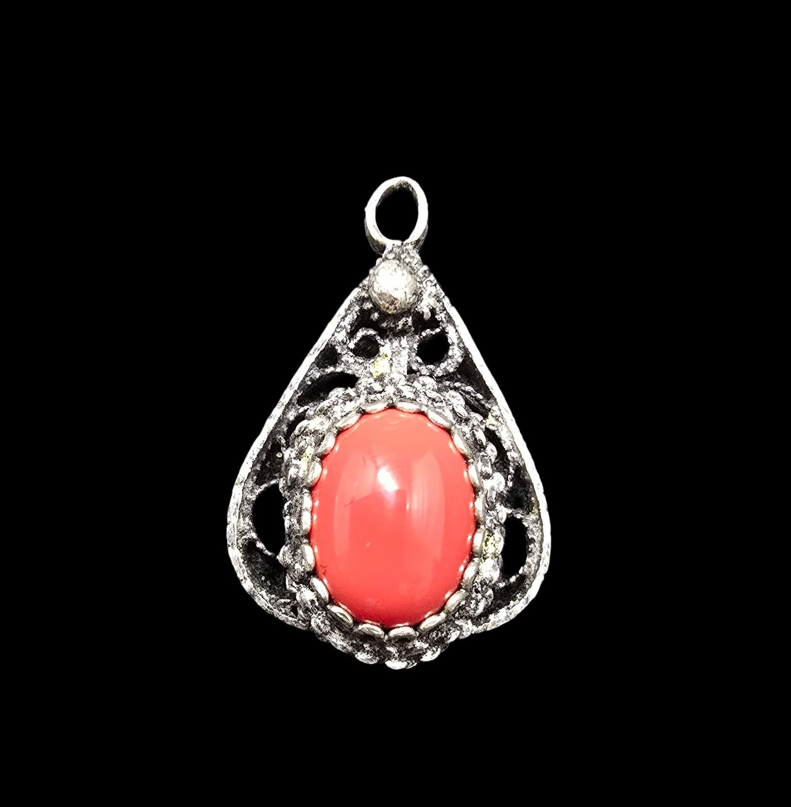 Gorgeous Ornate Vintage Sterling Silver Filigree & Red Coral Pendant: Very good vintage condition with minor patina according to age. Measures approx. 1/2" wide and weighs ca. 1 grams. Marked for Sterling Silver.