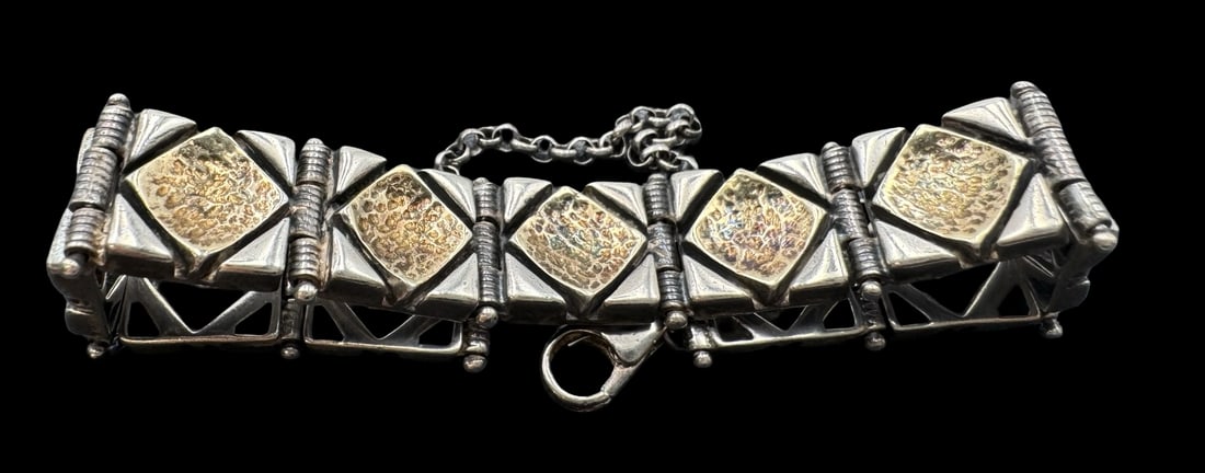 Unusual Vintage Mid-Century Modern Partially Gilt Sterling Silver Panel Bracelet: Very good vintage condition with minor patina according to age. Measures approx. 1/2" wide, inner circumference is approx. 7" and the piece weighs ca. 30.1 grams. Marked for Sterling Silver..