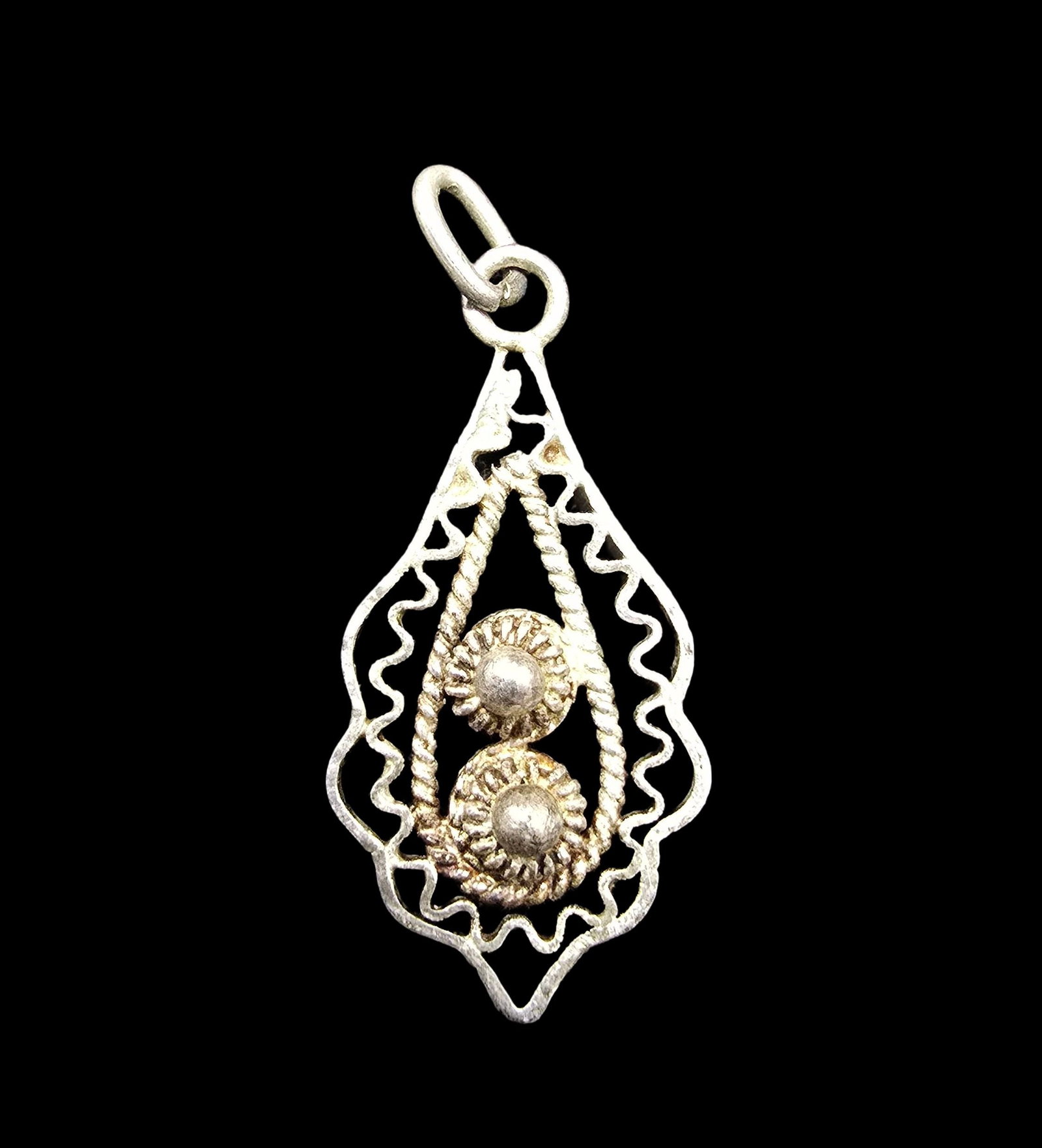 Amazing Ornate Vintage Sterling Silver Filigree Pendant: Very good vintage condition with minor patina according to age. Measures approx. 1/2" wide and weighs ca. 1 grams. Marked for Sterling Silver.