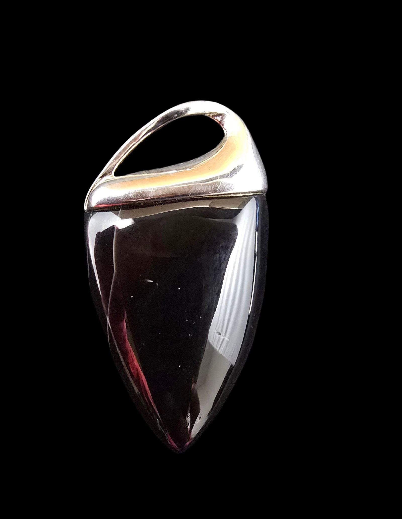 Beautiful Vintage Sterling Silver & Black Onyx Pendant: Very good vintage condition with minor patina according to age. Measures approx. 1 1/2" long and 1" wide and weighs ca. 10.5 grams. Marked for Sterling Silver.