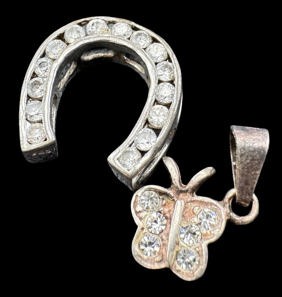 Lot of 2 Vintage Sterling Silver Pendant Charms & Clear Rhinstones: Very good vintage condition with minor patina according to age. The largest piece measures approx. 5/8" long x 5/8" wide and they jointly weigh ca. 2.2 grams. Marked for Sterling Silver..