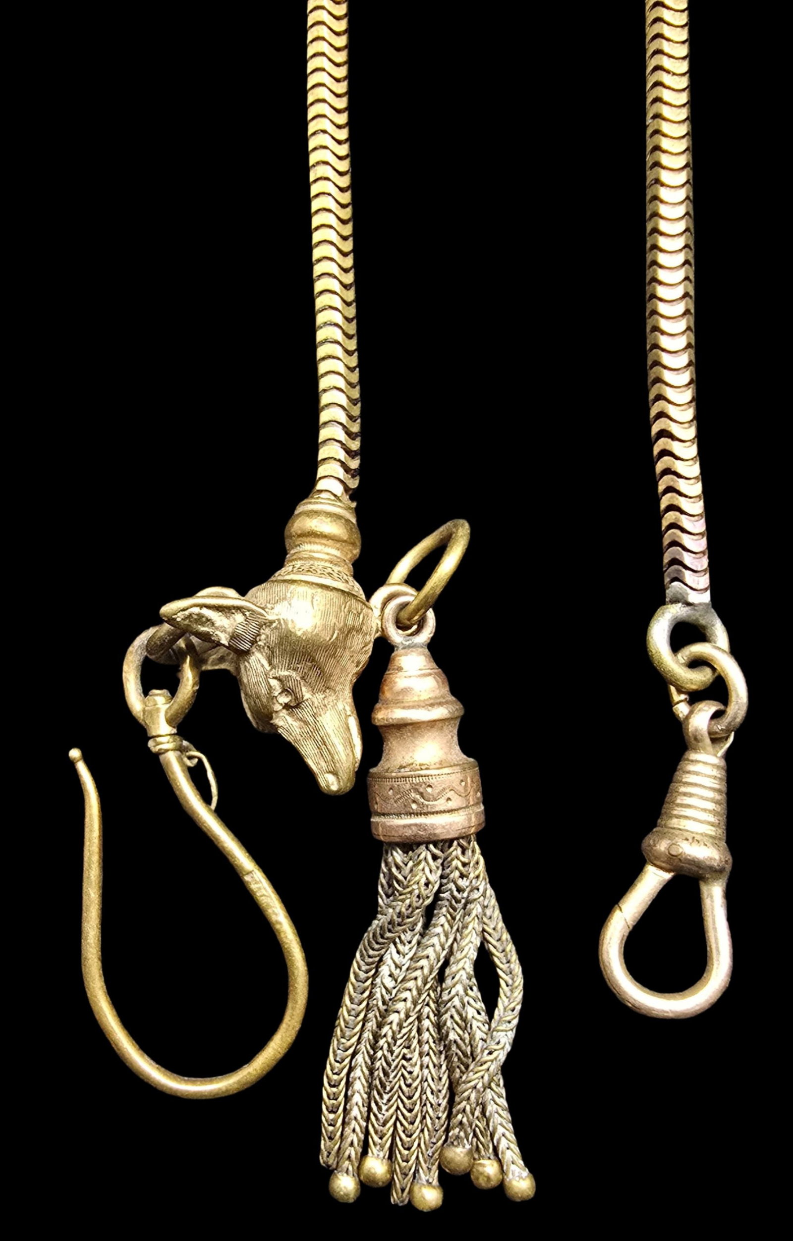 Rare Ornate Antique Gold Filled Pocket Watch Chain /w Dog Head Figurine: Very good vintage condition with minor patina according to age. Measures approx. 15" long and 1/2" wide and weighs ca. 22.5 grams.