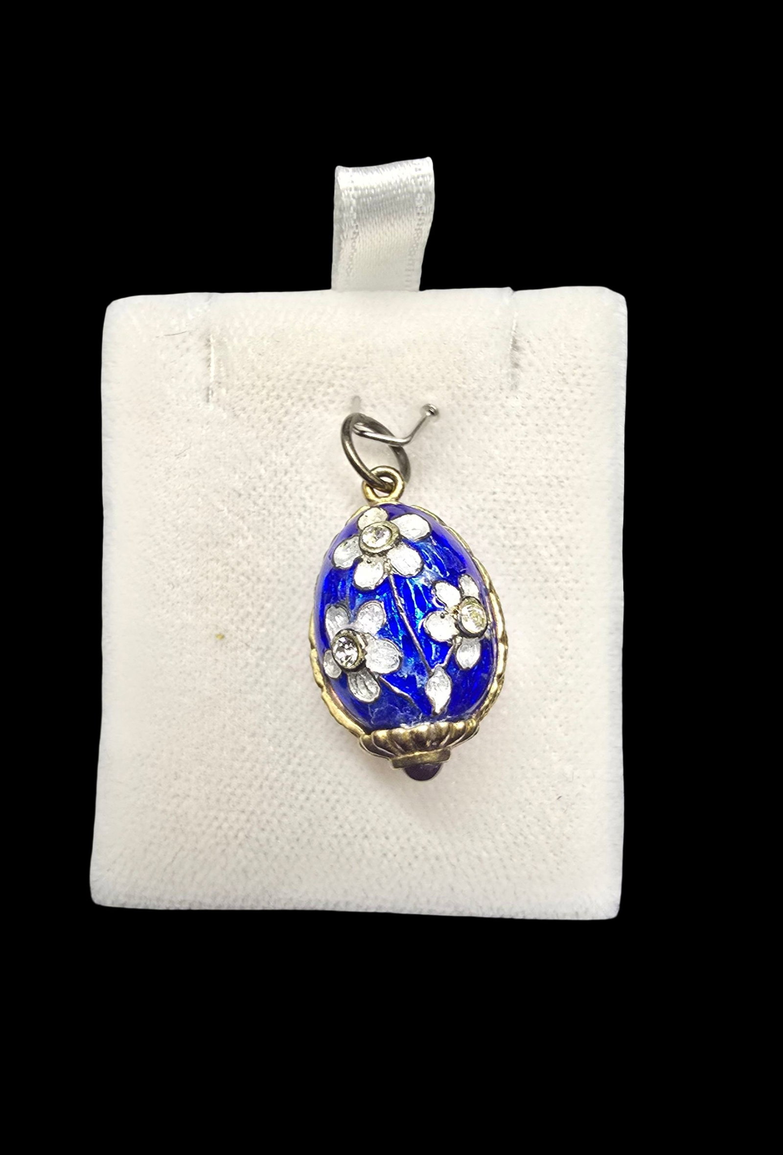 Gorgeous Ornate Vintage Gilt Sterling Silver, Blue Enamel & Clear Rhinestones Egg Pendant Charm in: Very good vintage condition with minor patina according to age. Measures approx. 1/2" wide and weighs ca. 10 grams. Marked for Sterling Silver.
