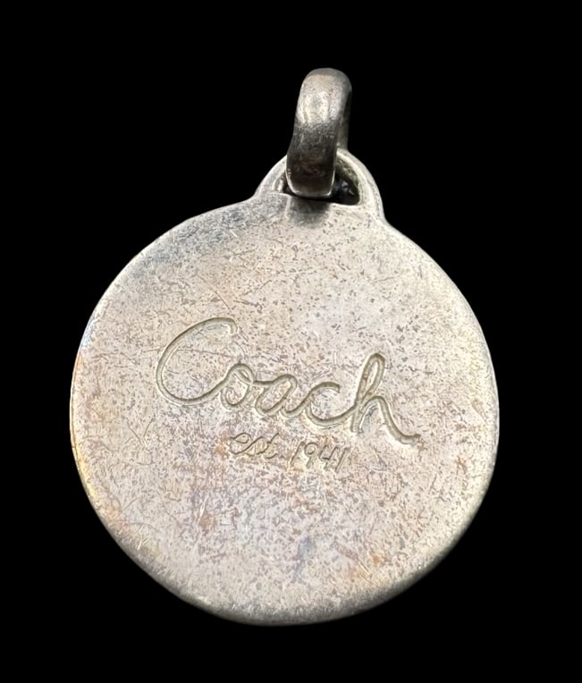 Vintage COACH Sterling Silver Pendant Charm: Very good vintage condition with minor patina according to age. Measures approx. 5/8" in diameter and weighs ca. 2.4 grams. Tested for Sterling Silver.
