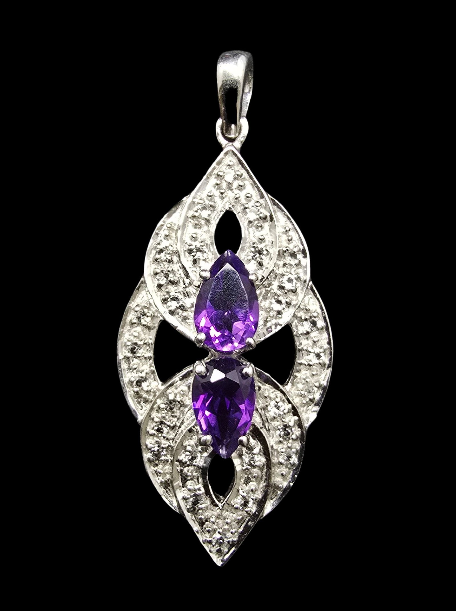 Amazing Ornate Vintage Sterling Silver & Amethyst Pendant Charm: Very good vintage condition with minor patina according to age. Measures approx. 1/2" wide and weighs ca. 6 grams. Marked for Sterling Silver.