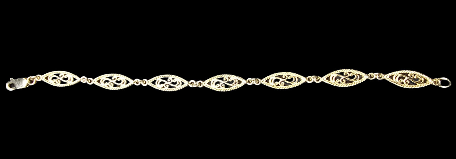 Beautiful Ornate Vintage Gilt Sterling Silver Filigree Bracelet: Very good vintage condition with minor patina according to age. Weighs ca. 7 grams. Marked for Sterling Silver.