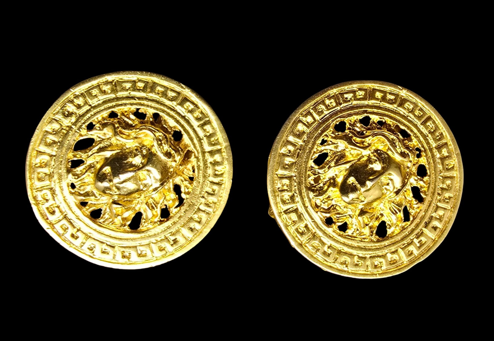 Beautiful Ornate Vintage Costume Jewelry Gold Tone Medusa Head Clip-On Designer Earrings: Very good vintage condition with minor patina according to age. Measures approx. 1" wide and weighs ca. 20.5 grams. Marked.
