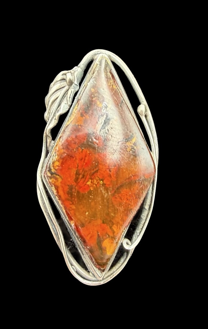Beautiful Vintage Sterling Silver & Amber Ring: Very good vintage condition with minor patina according to age. Measures approx. 1 1/2" long and 3/4" wide and weighs ca. 11.3 grams. The ring is a size 7 1/2. Tested for Sterling Silver