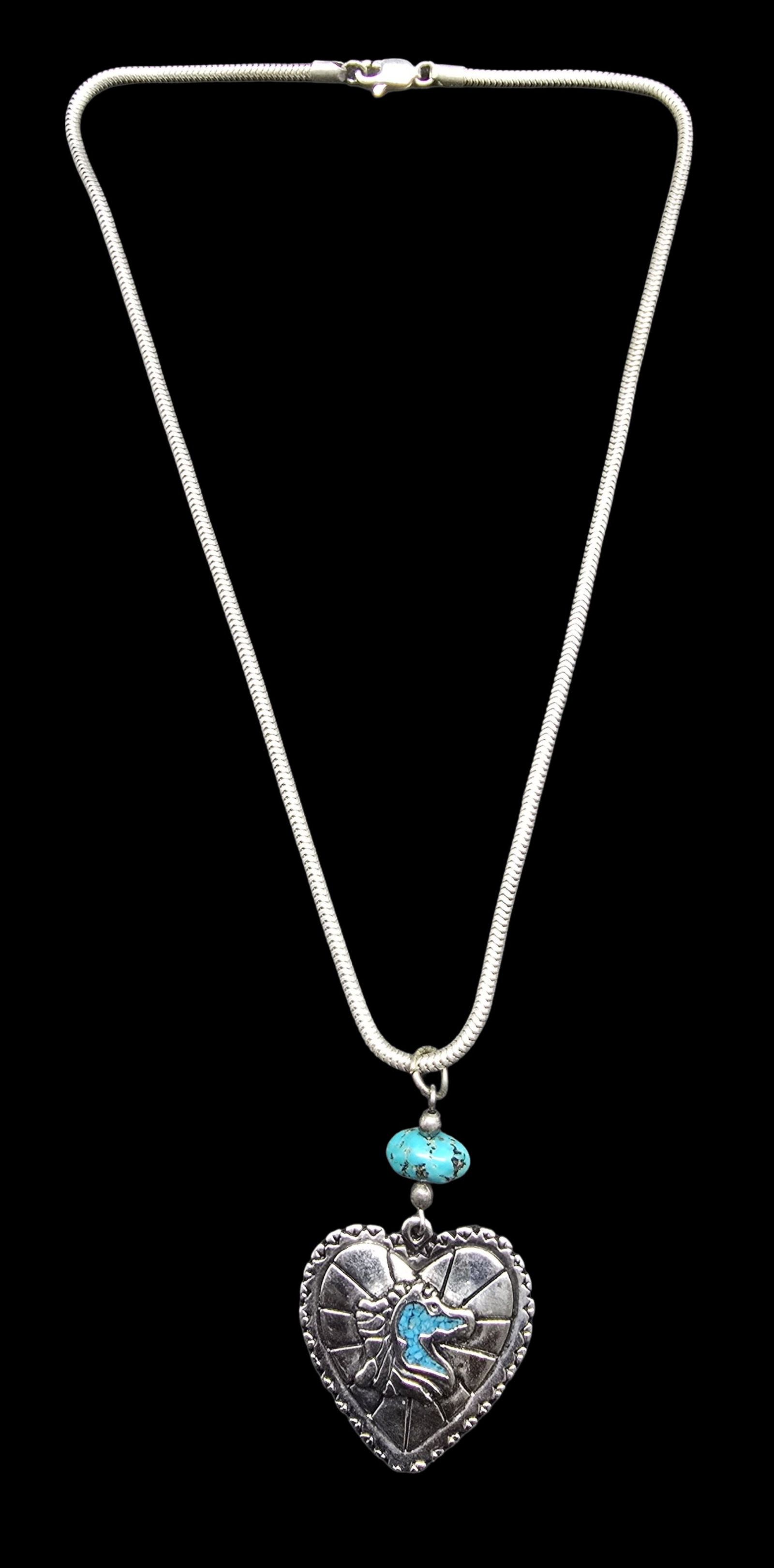 Beautiful Ornate Vintage Sterling Silver Western & Inlaid Turquoise Inlaid Horse Heart Pendant: Very good vintage condition with minor patina according to age. Weighs ca. 16 grams. Necklace is 18" long. Marked Sterling Silver