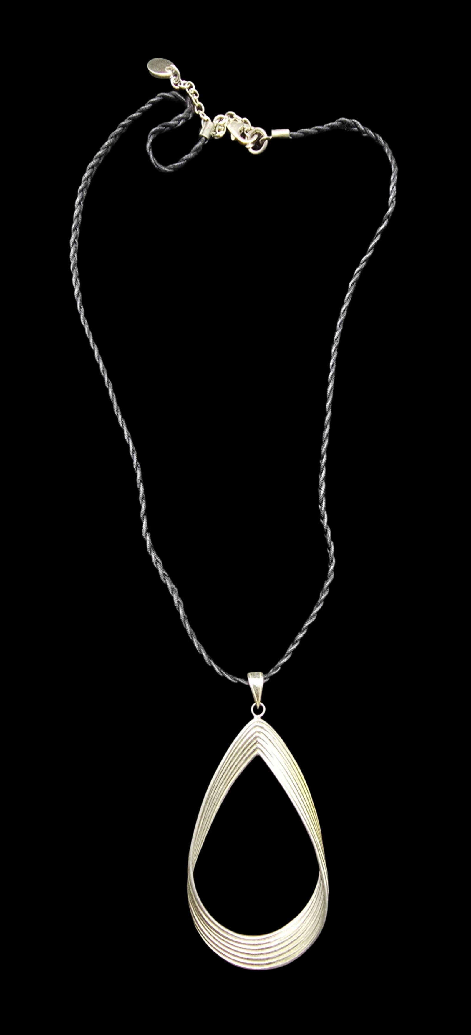 Amazing Ornate Vintage Sterling Silver & Braided Leather Strap Pendant Necklace: Very good vintage condition with minor patina according to age. Pendant measures approx. 2 1/2" long and 1" wide and weighs ca. 9.5 grams. Necklace is 19" long. Marked Sterling Silver