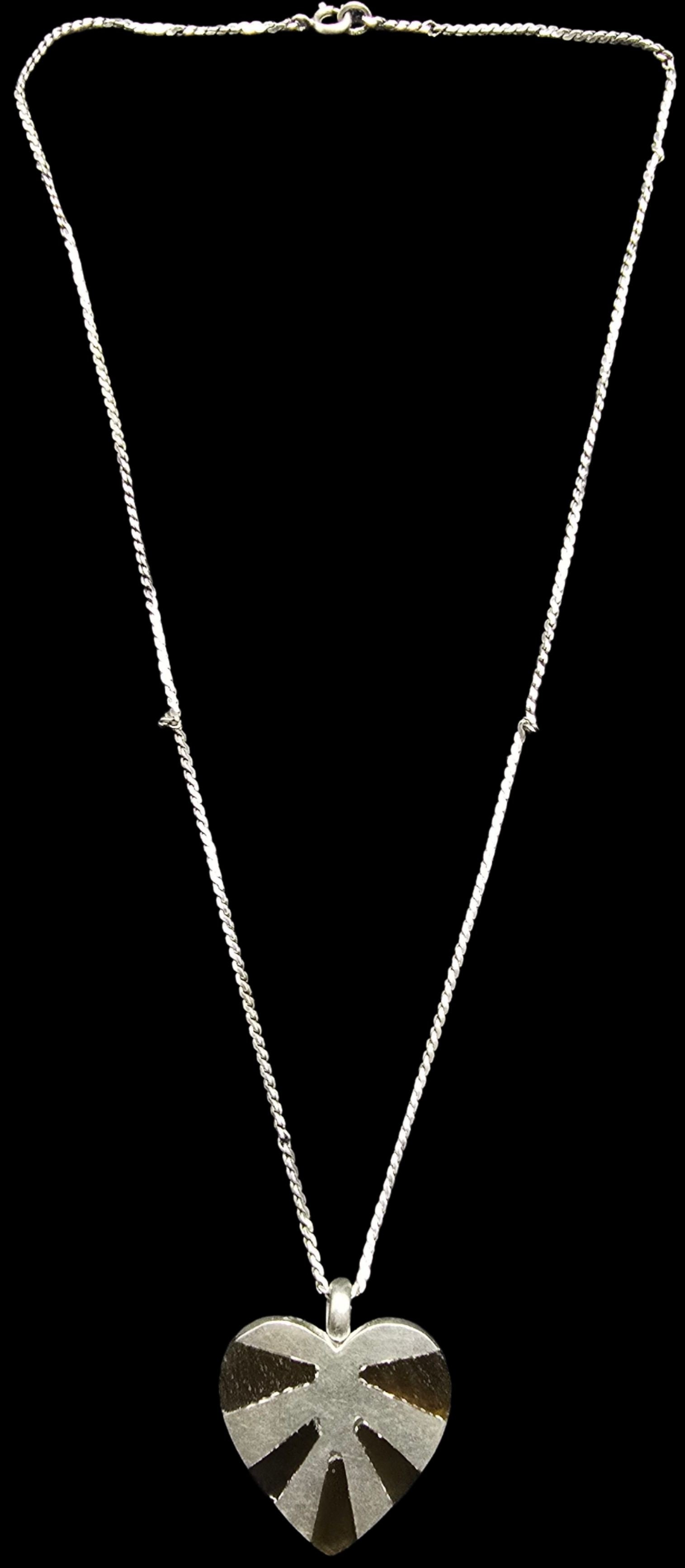 Gorgeous Ornate Vintage Sterling Silver & Brown Enamel Heart Pendant Necklace: Very good vintage condition with minor patina according to age. Pendant weighs ca. 10 grams. Necklace is 19" long. Marked Sterling Silver