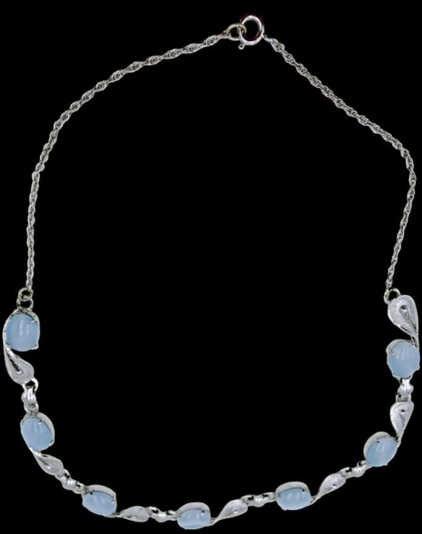 Stunning Ornate Vintage ALICE CAVINESS Sterling Silver Filigree w/ Light Blue Moonstone Necklace: Very good vintage condition with minor patina according to age. Measures approx. 5" long and 1/2" wide and weighs ca. 15.6 grams. Marked Sterling Silver & ALICE CAVINESS