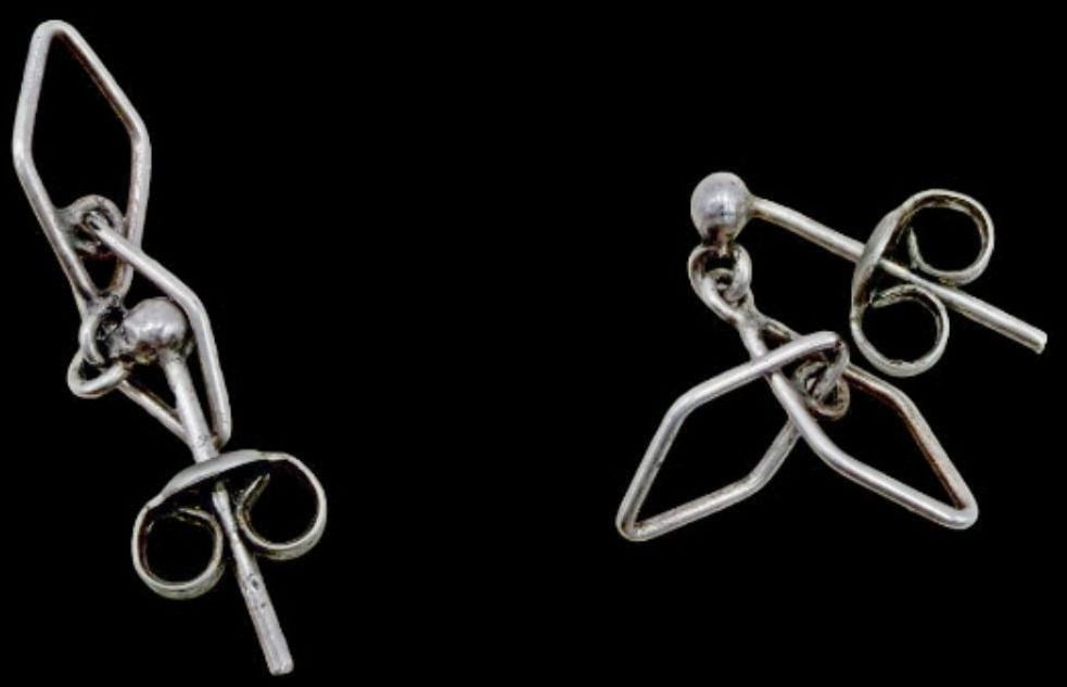 Gorgeous Ornate Vintage Sterling Silver Earrings: Very good vintage condition with minor patina according to age. Measures approx. 1/2" long and 1/2" wide and weighs ca. 0.8 grams. Tested for Sterling Silver