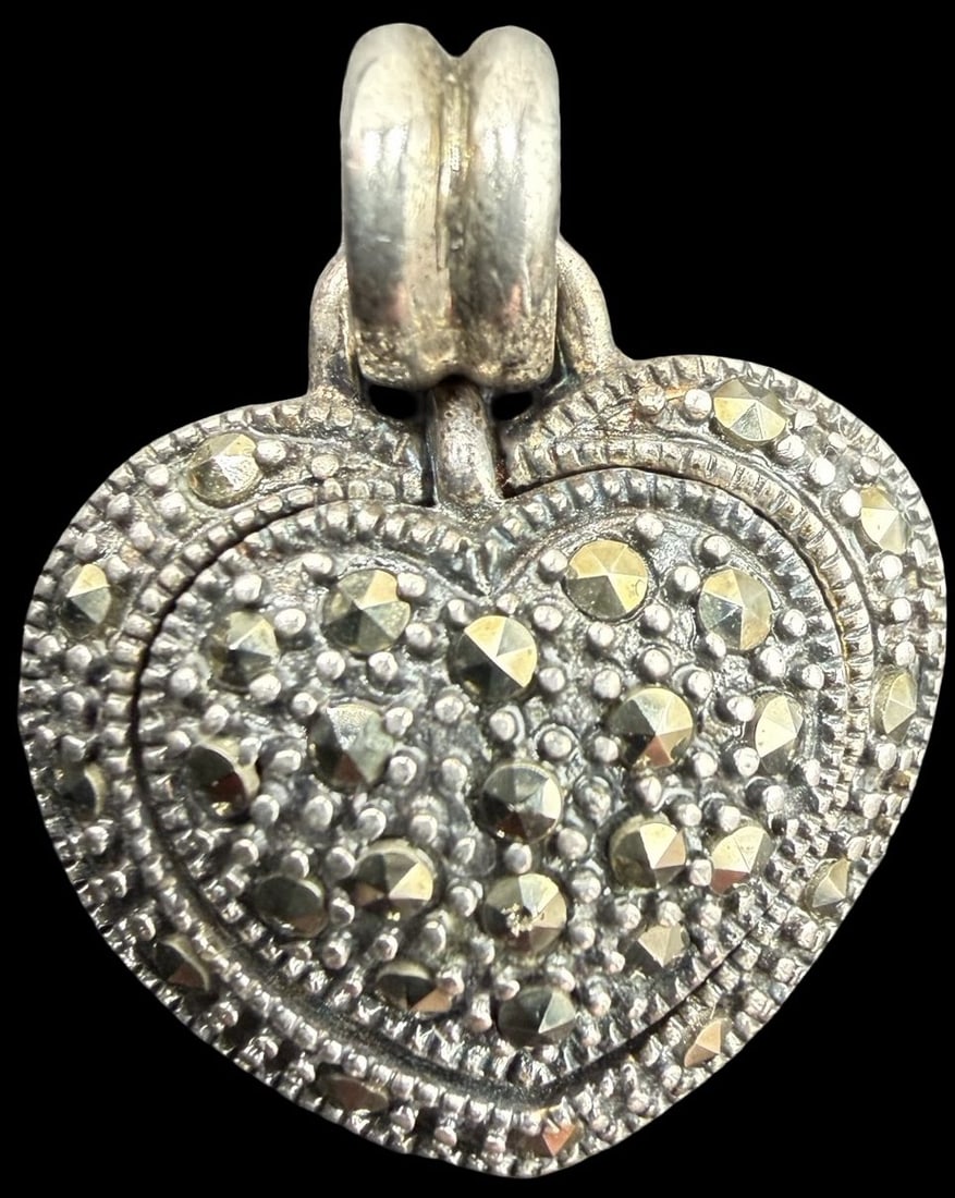Stunning Ornate Vintage Gilt Sterling Silver & Marcasite Heart Shaped Pendant: Very good vintage condition with minor patina according to age. Measures approx. 3/4" long and 3/4" wide and weighs ca. 4.5 grams. Marked Sterling Silver