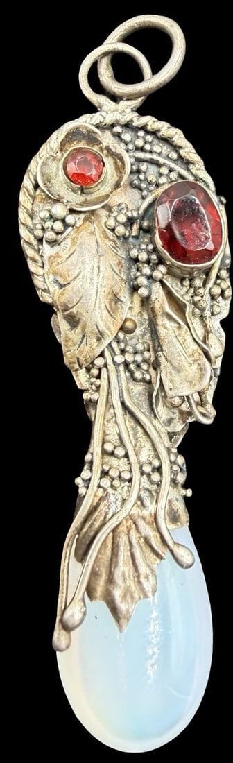 Stunning Ornate Vintage Gilt Sterling Silver Red Gemstones & Moonstone Pendant: Very good vintage condition with minor patina according to age. Measures approx. 2 1/4" long and 1/2" wide and weighs ca. 7.6 grams. Tested for Sterling Silver ???
