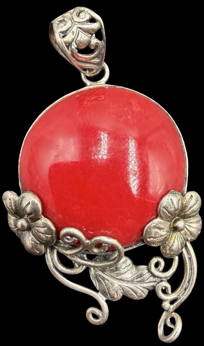 Unusual Ornate Vintage Sterling Silver & Red Gemstone Pendant Charm: Very good vintage condition with minor patina according to age. Measures approx. 1 1/2" long and 1" wide and weighs ca. 6.1 grams. Tested for Sterling Silver