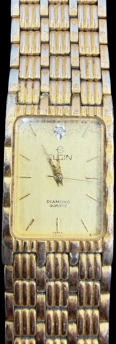 Gorgeous Vintage ELGIN Stainless Steel Gold Tone & Clean Diamond Quartz Watch: Very good vintage condition with minor patina according to age. Measures approx. 1" long and 3/4" wide and weighs ca. 104.09 grams. Marked for ELGIN. Watch isn't working.